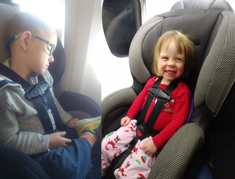 two children buckled in car seats on airplane