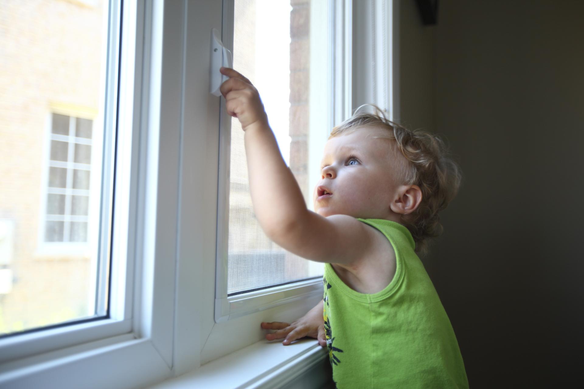 child opening window lock